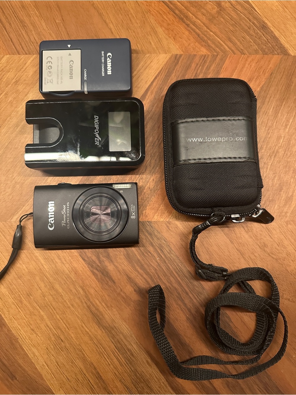 Canon Black Compact ELPH Digital Camera Bundle with Charger, Battery & Case